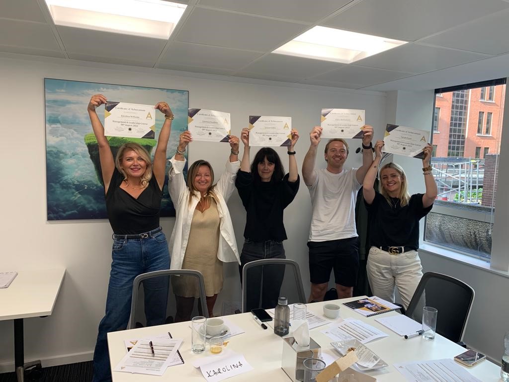 Delegates proudly displaying their CPD certificates