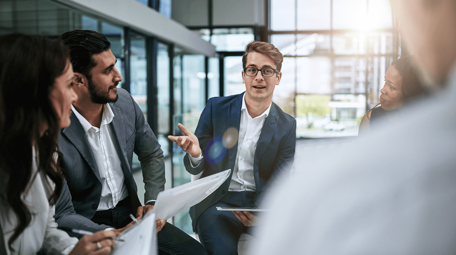 Executive leadership development training with diverse business professionals in UK training centre